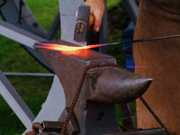 blacksmith striking anvil