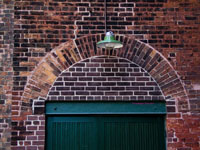 delivery door in old brick wall