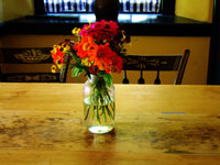 flowers on antique kitchen table