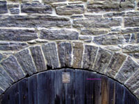 archway in vintage stone wall